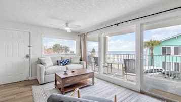 Family Condo, Ocean View | Living area | TV