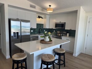 Condo família, vista para a praia | Cozinha privada