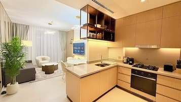 2 bedroom 2 Bathroom Apartments with Burj Khalifa Views | In-room safe, desk, blackout drapes, iron/ironing board
