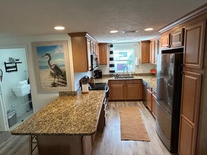 Fridge, microwave, oven, stovetop - AMI Sunset Beach Gulf View Retreat w/ Pool + Decks + WiFi + Dog-friendly (Bradenton Beach)