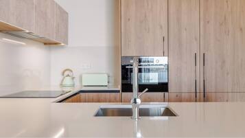 Microwave, stovetop, cookware/dishes/utensils