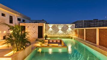 Outdoor pool, pool umbrellas, sun loungers