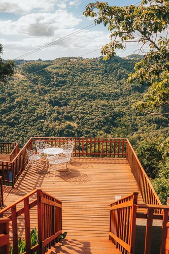 Chalet surrounded by nature with a view of the stars.