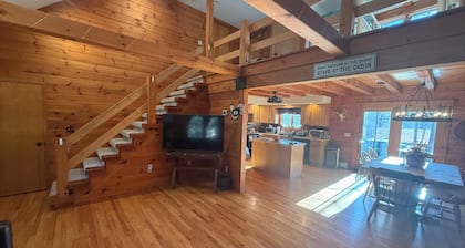 Charming 2-bedroom cabin on 25 acres with loft space and full basement