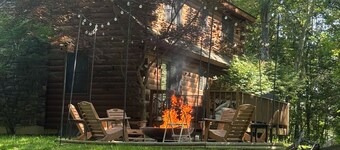 Charming 2-bedroom cabin on 25 acres with loft space and full basement