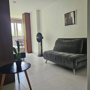 Loft, City View | Living area | Flat-screen TV - La Estación Lofts By LGH (Medellín)