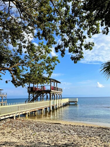 Royal Palm Hacienda Beach front home with private dock on Treasure Beach Utila