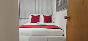 Deluxe Apartment, 2 Bedrooms, Private Bathroom, Courtyard View | Blackout curtains, iron/ironing board, free WiFi