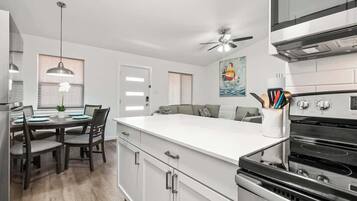 Stovetop, dishwasher, coffee/tea maker, cookware/dishes/utensils