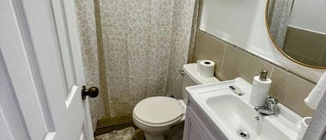 Hair dryer, towels, soap, toilet paper