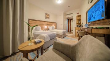 Quarto duplo | Cofres nos quartos, cortinas blackout, ferros/tábuas de passar roupa