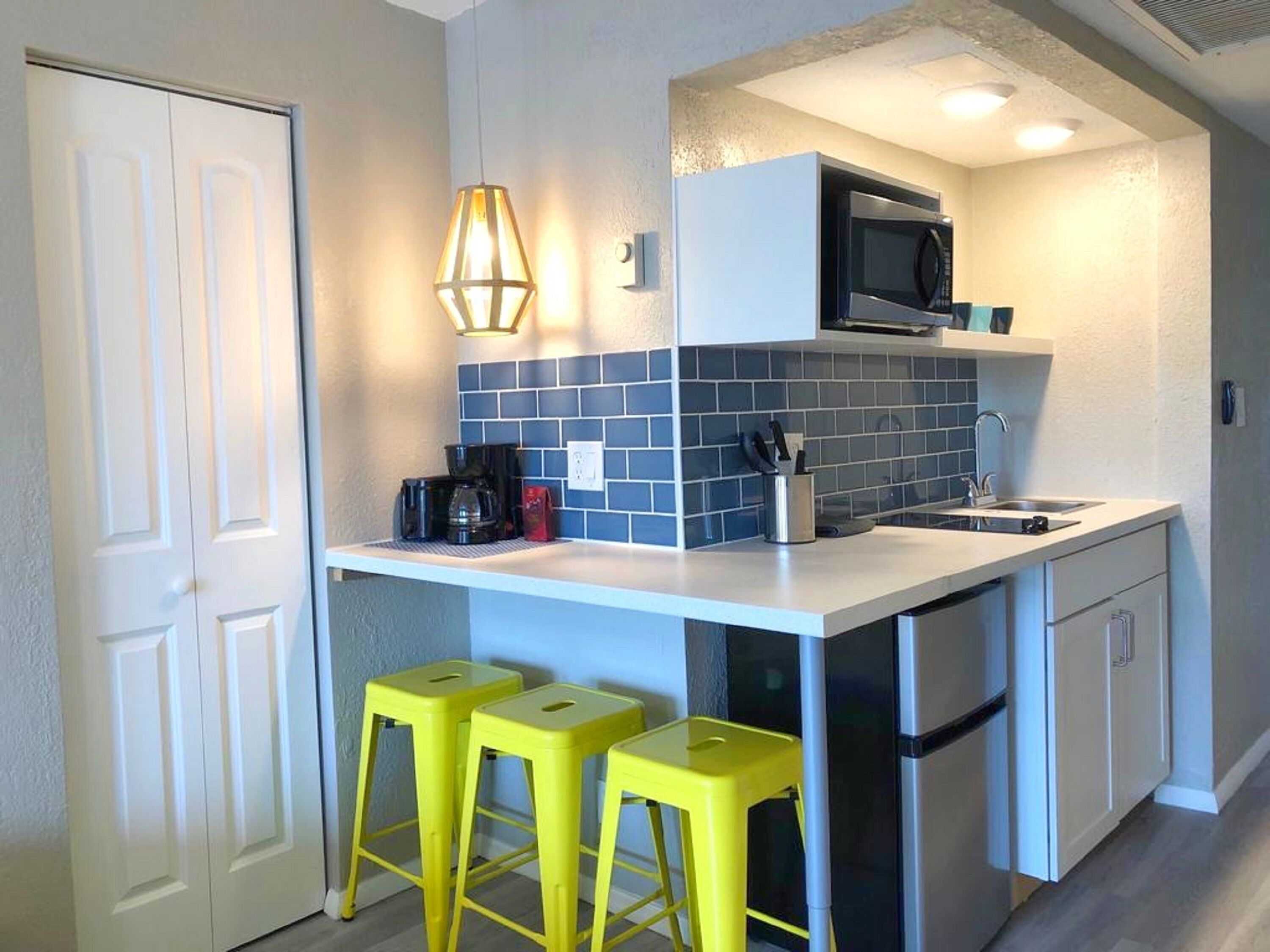 Fridge, microwave, stovetop, coffee/tea maker