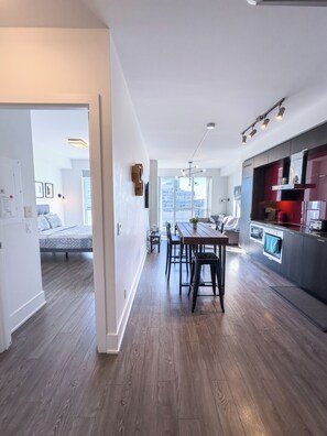 Comfort Suite, Partial Lake View | Living area | 50-inch Smart TV with digital channels, Netflix, streaming services