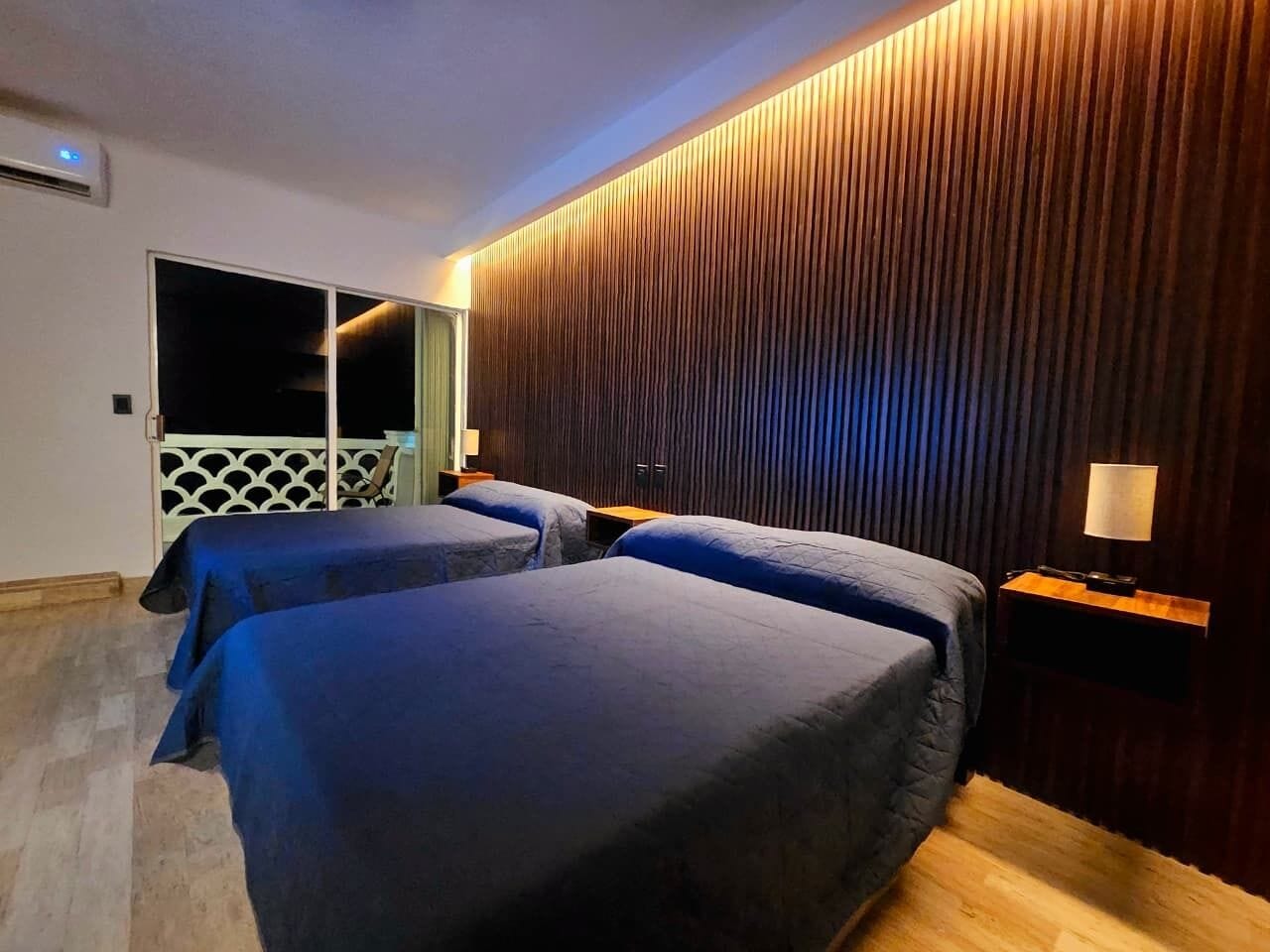 Deluxe Suite, Balcony, Ocean View | In-room safe, blackout drapes, iron/ironing board, free WiFi