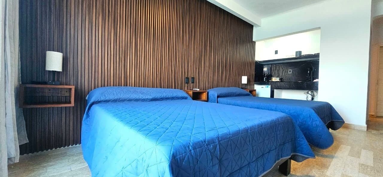 Deluxe Suite, Balcony, Ocean View | In-room safe, blackout drapes, iron/ironing board, free WiFi