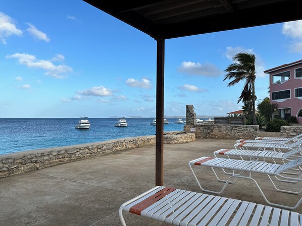 Terrace/patio - Octopus’ Garden, Ocean front 2-bedroom/2.5 bath townhome at Sand Dollar. (Kralendijk)
