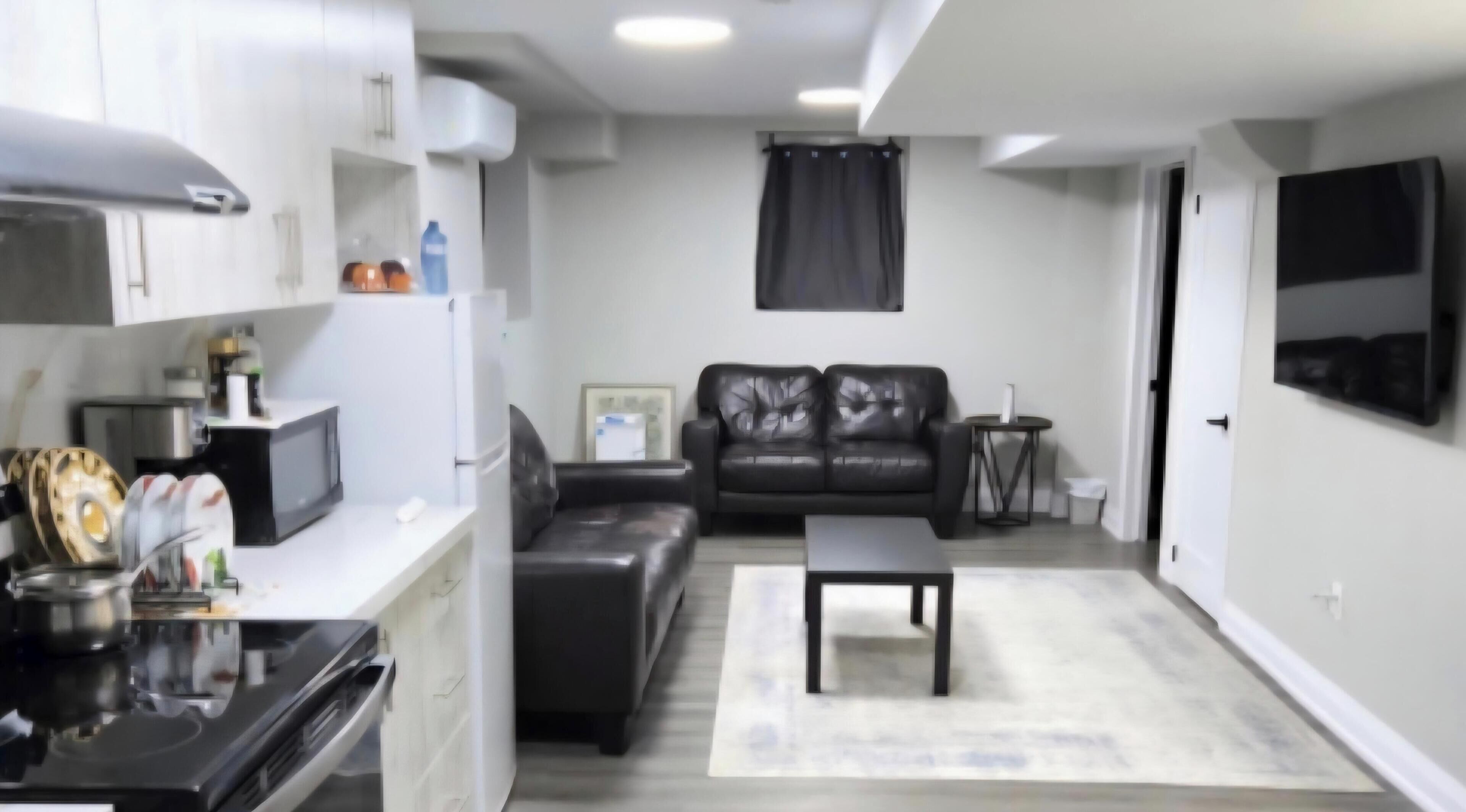 lounge with tv, table and sofa set