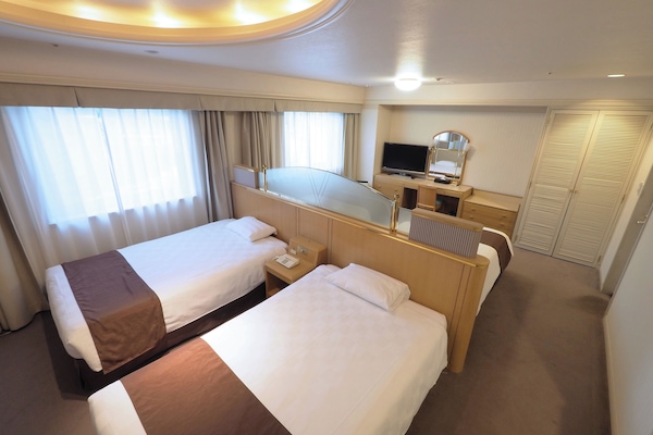 Deluxe Quadruple Room | Free WiFi, bed sheets