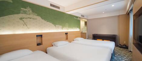 A hotel room with three beds, a wall-mounted clock, a fireplace, and a large mural.