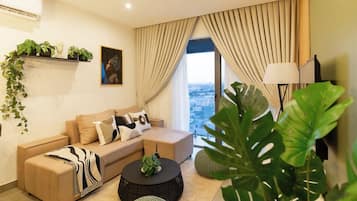 Deluxe Apartment, Balcony, City View | Living area