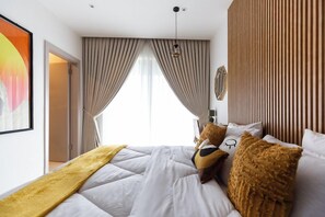 Căn hộ Deluxe, ban công, quang cảnh thành phố | Bàn ủi/dụng cụ ủi quần áo, truy cập Internet không dây miễn phí 