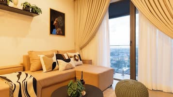 Deluxe Apartment, Balcony, City View | Living area