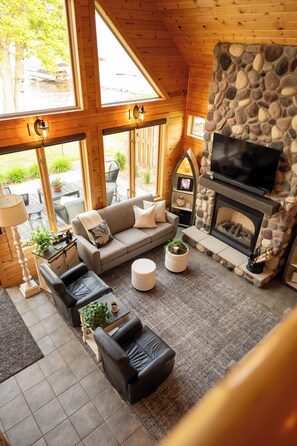 Smart TV, fireplace, foosball, books