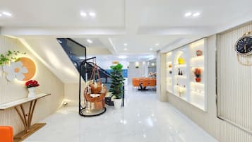 Deluxe Room, Balcony, City View | Living area