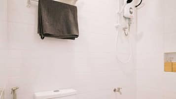 Shower, towels, soap, shampoo