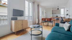 A modern apartment with a living room, dining area, and kitchen. - Blueground | Gros-Caillou, view, nr Eiffel Tower (Paris)