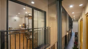 Deluxe Triple Room, Non Smoking, Courtyard View | Minibar, in-room safe, desk, laptop workspace