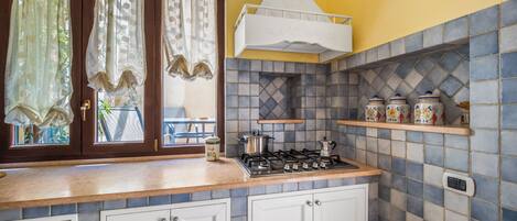 Family Apartment | Private kitchen | Fridge, microwave, oven, stovetop