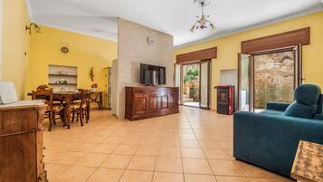 Family Apartment | Living area | 46-inch flat-screen TV with digital channels