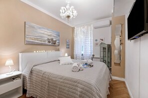 Apartamento familiar, varias habitaciones (Casa Amorosa Town Center) | 1 dormitorio, tabla de planchar con plancha, wifi gratis y ropa de cama