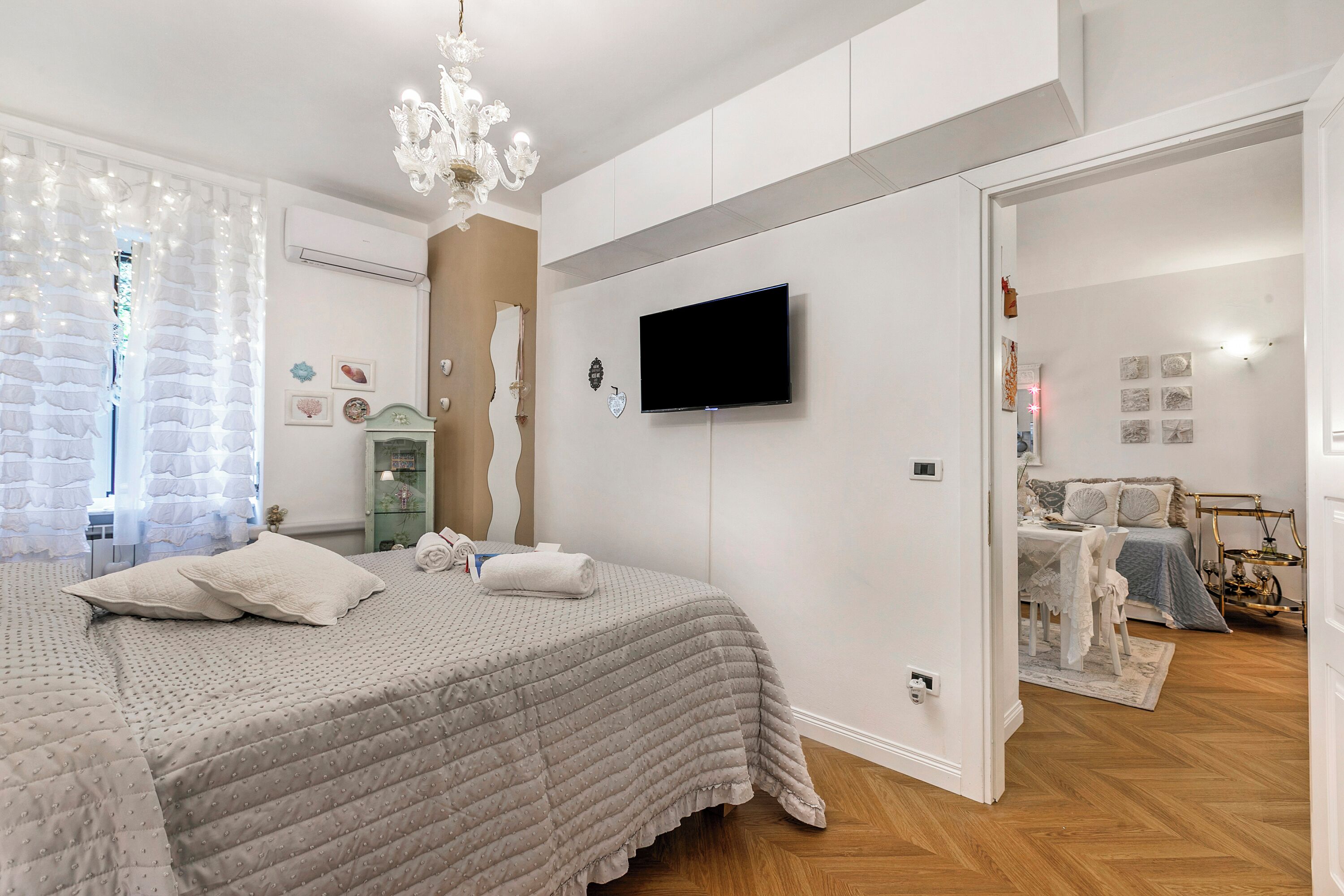 Family Apartment, Multiple Bedrooms (Casa Amorosa Town Center) | 1 bedroom, iron/ironing board, free WiFi, bed sheets