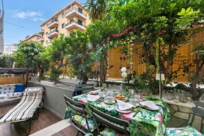 Family Apartment, 1 Bedroom, Terrace (Casa Amorosa Town Center) | Outdoor dining