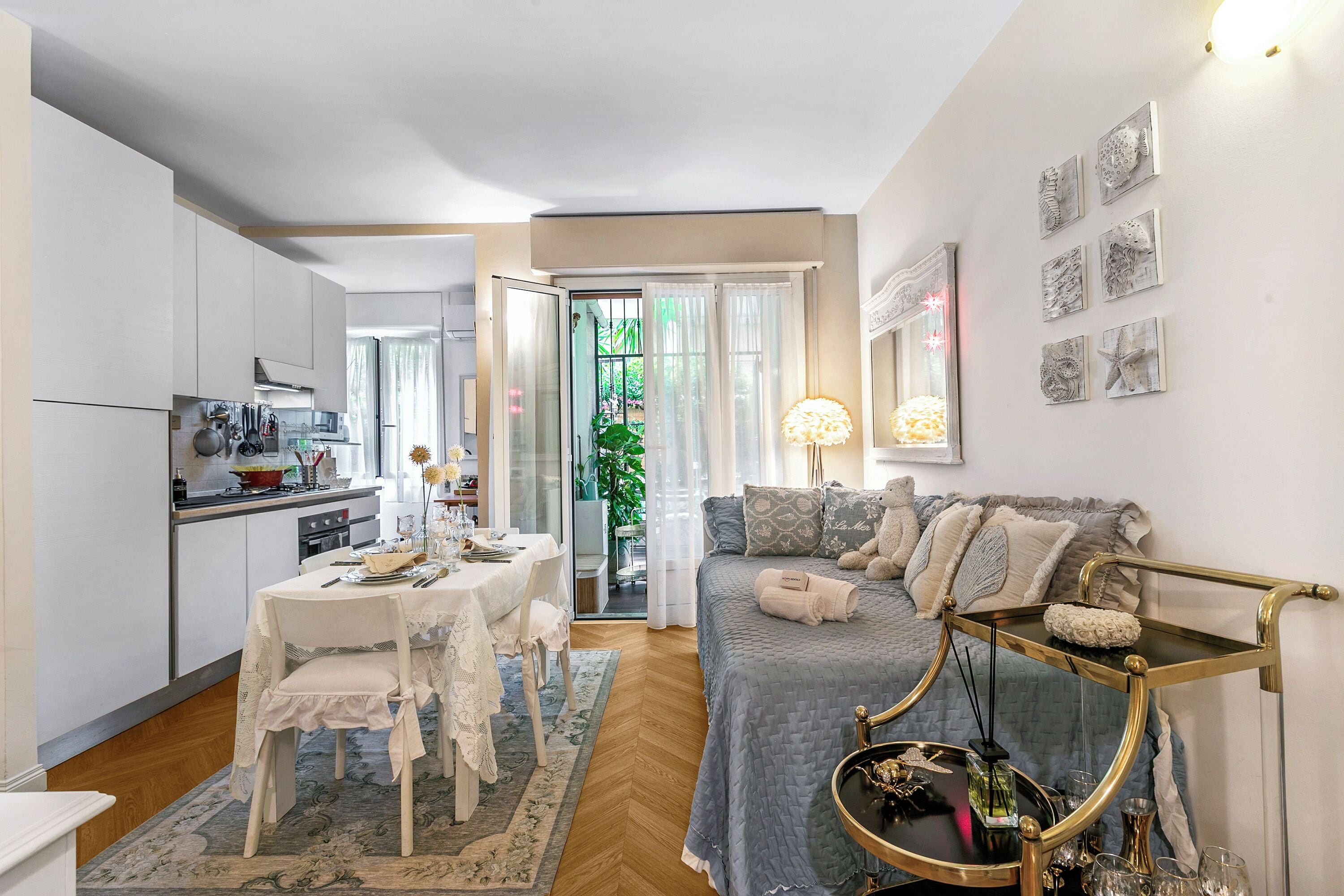 Family Apartment, Multiple Bedrooms (Casa Amorosa Town Center) | Living area | 21-inch flat-screen TV with cable channels
