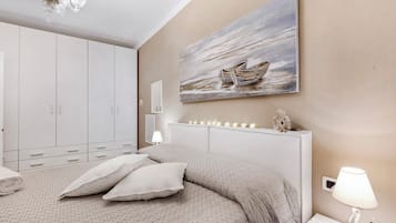 Familienapartment, Mehrere Schlafzimmer (Casa Amorosa Town Center) | 1 Schlafzimmer, BĂŒgeleisen/BĂŒgelbrett, kostenloses WLAN, BettwĂ€sche