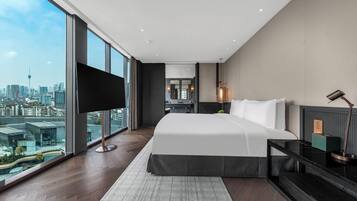 Premium bedding, pillow-top beds, free minibar, in-room safe