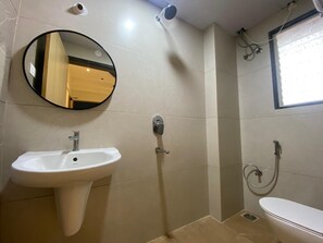 Dutxa, tovalloles, sabó i xampú 