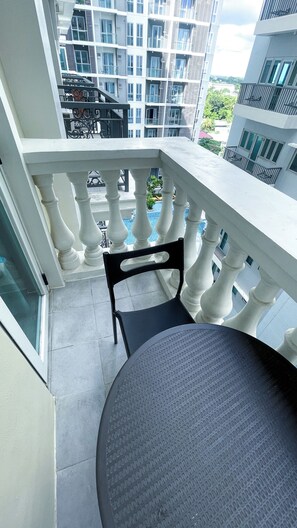 Shared Dormitory, 1 Bedroom, Balcony, Pool View | Balcony - Room-modern Haven for Work & Leisure (Iloilo)