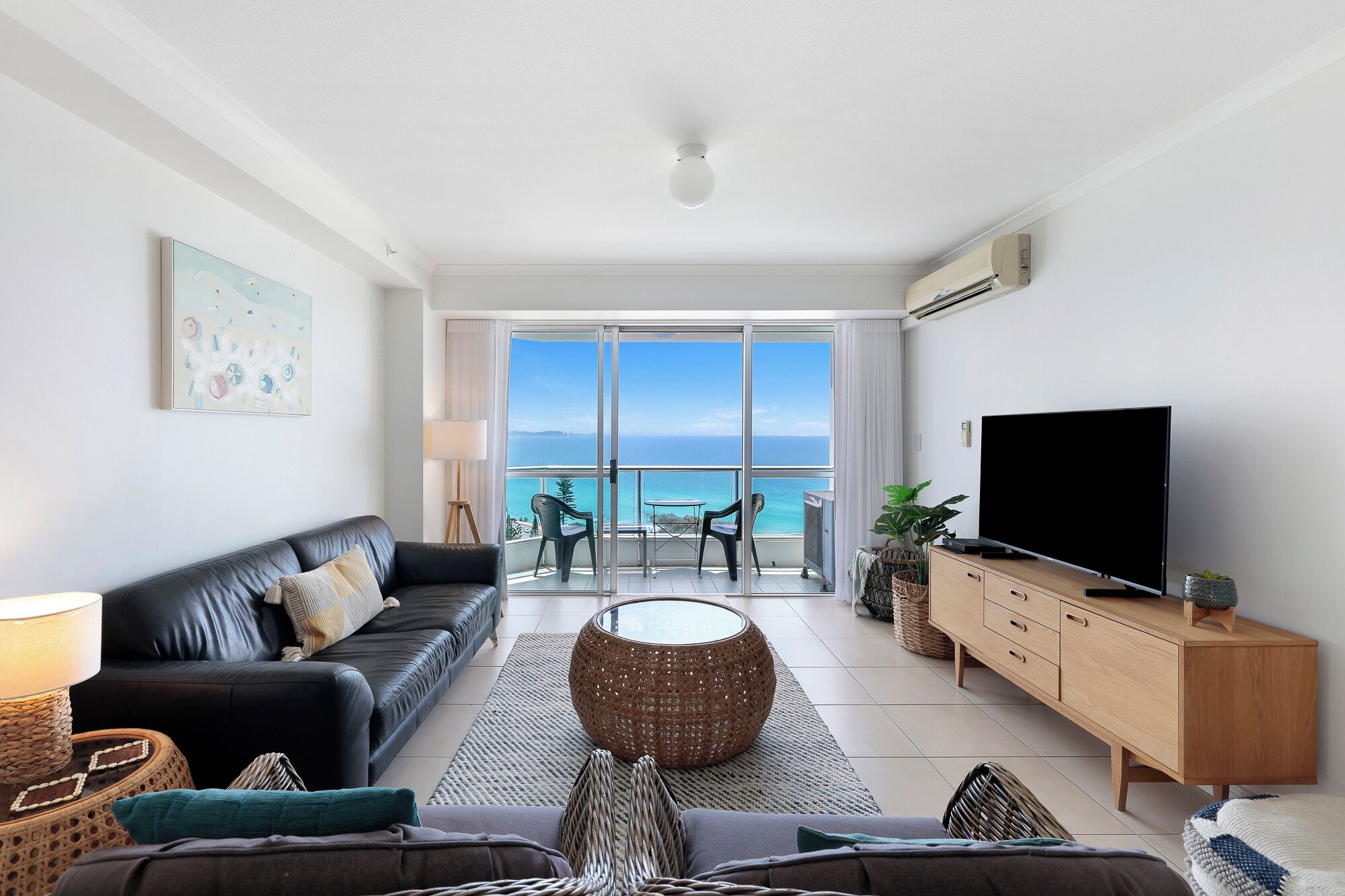 Standard Two Bedroom Apartment | Living area | 40-inch TV with cable channels