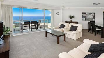 Superior Two Bedroom Ocean View Apartment | Living area | 40-inch TV with cable channels