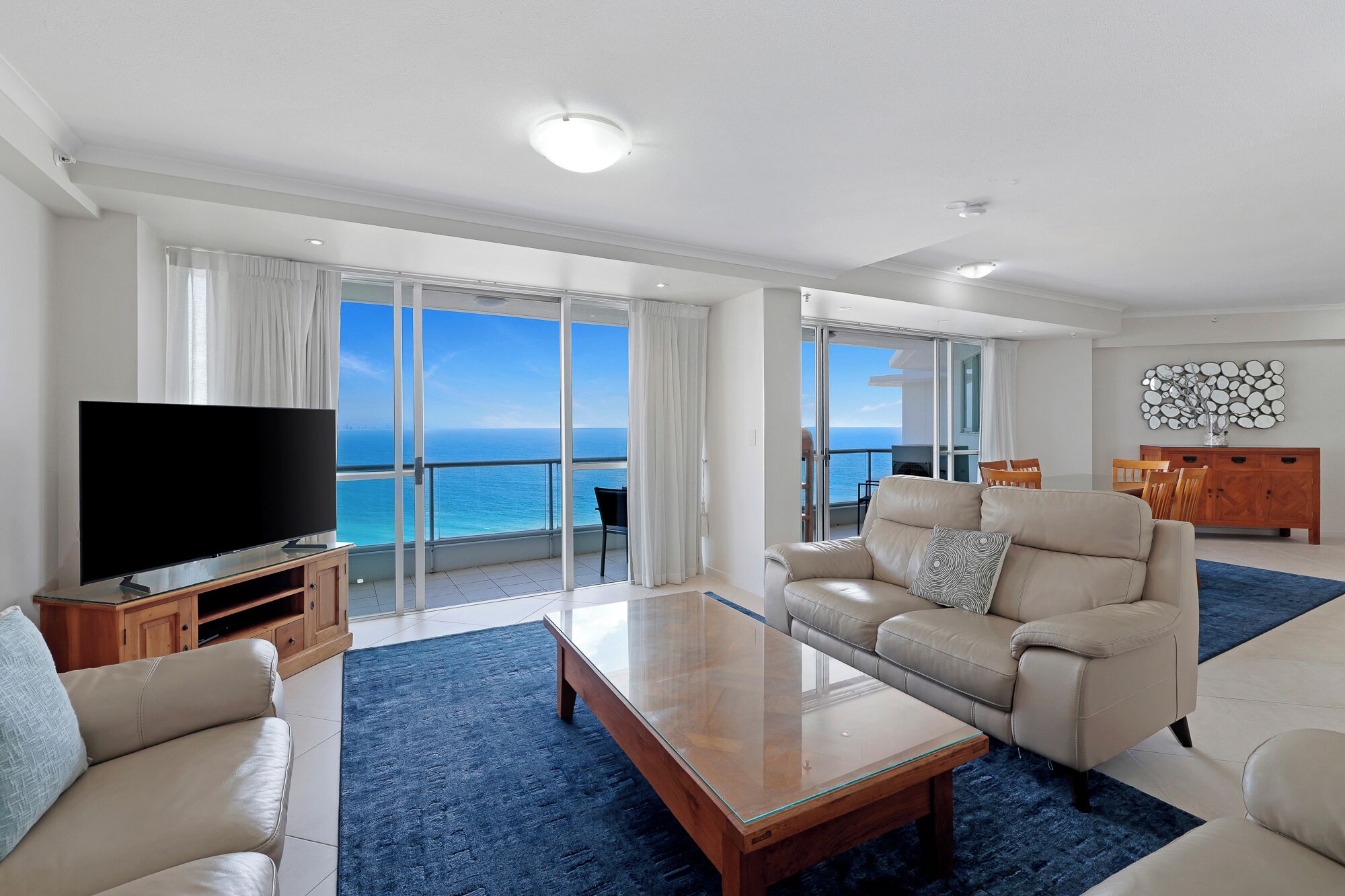 Superior Three Bedroom Ocean View Apartment | Living area | 40-inch TV with cable channels