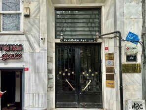 A building with a black door labeled "ParkPalas Apt. No:23". - 3-Bedroom Flat in Great Location in Taksim Beyoglu Istanbul (İstanbul)