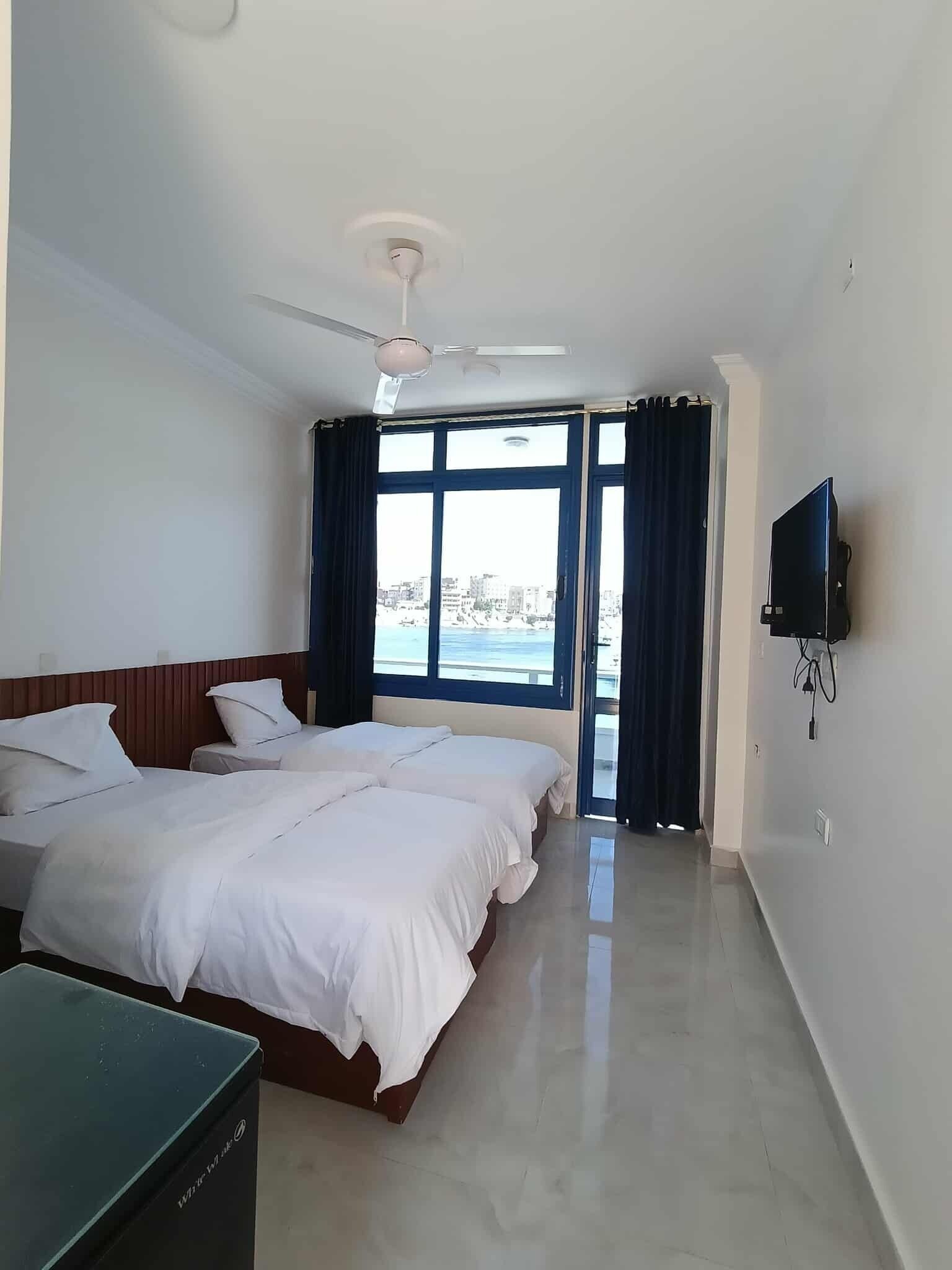 Chambre avec lits jumeaux, vue fleuve