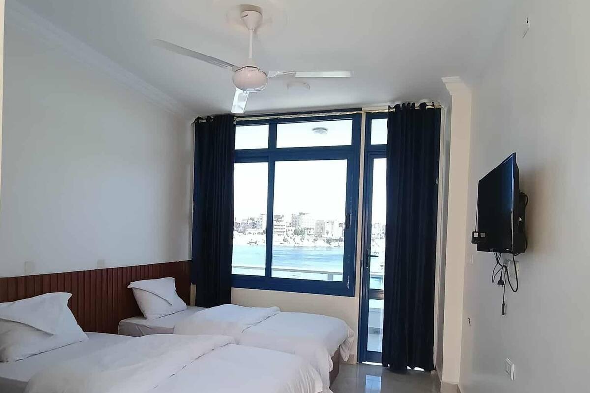 Twin Room, River View | Blackout drapes, free WiFi