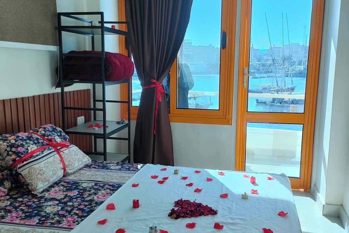 Double Room, 1 Queen Bed, River View | Blackout drapes, free WiFi