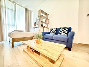 Living area - Elegant Studio in JVC (Dubai)