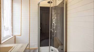 Shower, hair dryer, towels, soap